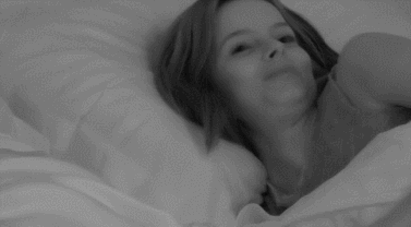 Maura laugh in bed